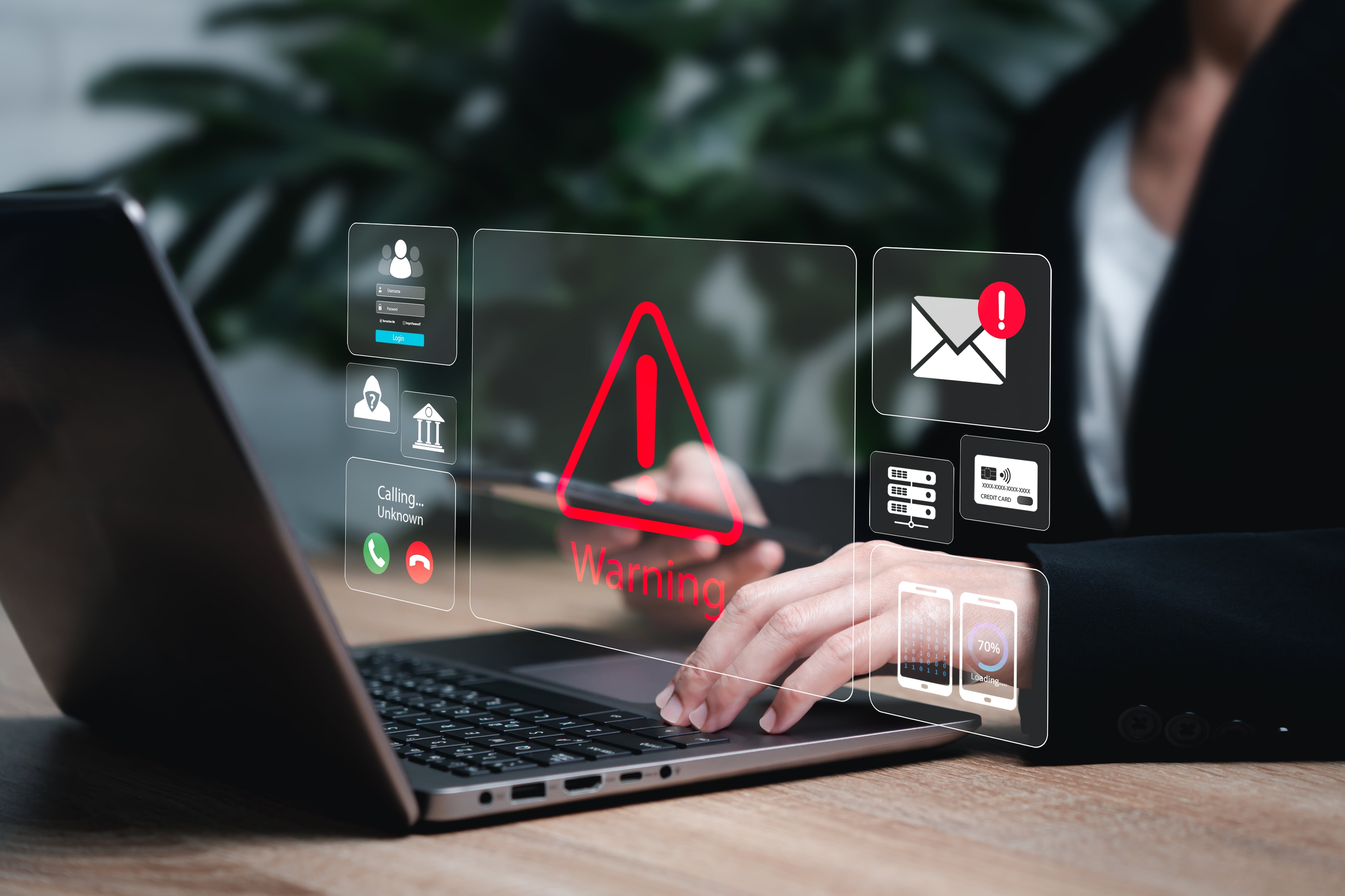 En la imagen una computadora con signos de advertencia