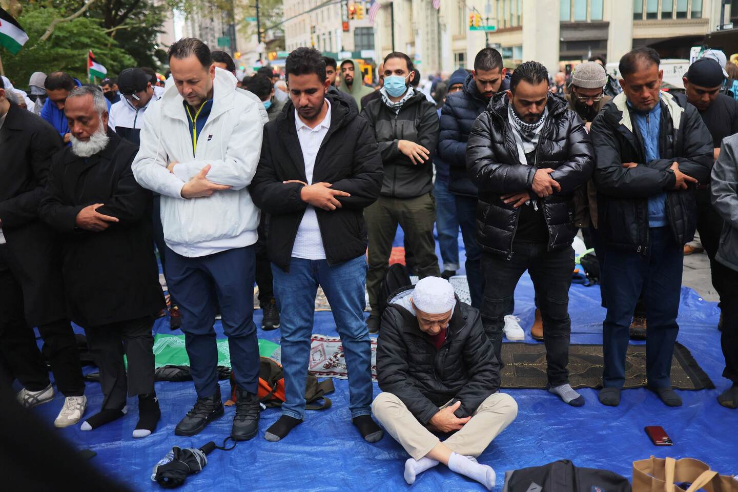 NEW YORK, NEW YORK - OCTOBER 20: Supporters of the people of Palestine gather for a Jumu'ah prayer and rally at City Hall on October 20, 2023 in New York City. Supporters of Palestine held a prayer service as they call lawmakers to declare a ceasefire of the bombings in Gaza. Thousands have been killed and wounded from bombarding of Palestine since Israel announced a �complete siege� on Gaza, cutting off access to water, food, electricity and fuel for the strip�s 2.3 million inhabitants, after the militant group Hamas launched a surprise attack on southern Israel, killing at least 1,400 people and taking more than 200 others captive. Michael M. Santiago/Getty Images/AFP (Photo by Michael M. Santiago / GETTY IMAGES NORTH AMERICA / Getty Images via AFP)