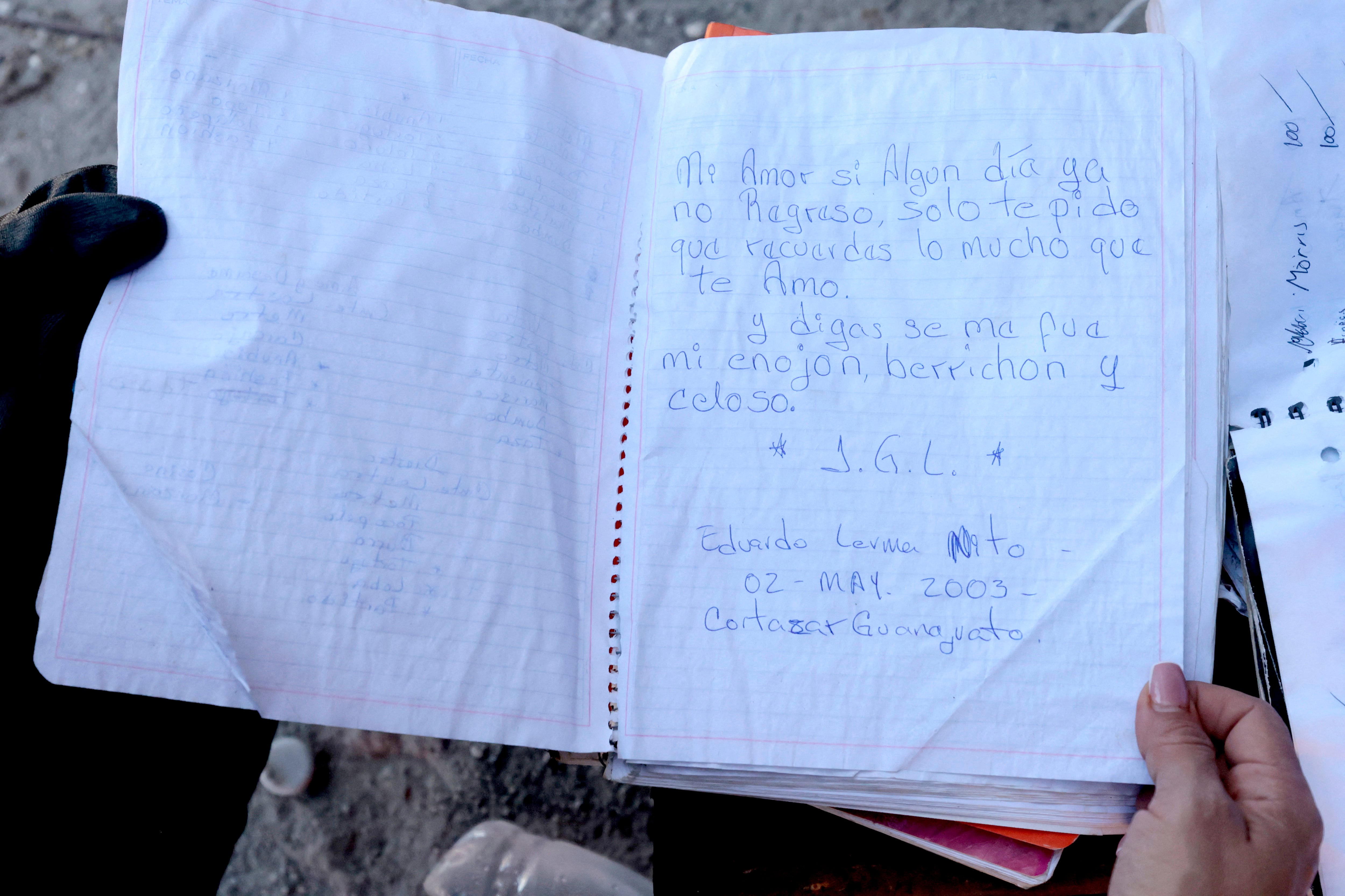 A notebook that reads in spanish 'My love, if one day I don't come back, I only ask you to remember how much I love you' is seen at the Izaguirre Ranch in the community of La Estanzuela, where the collect