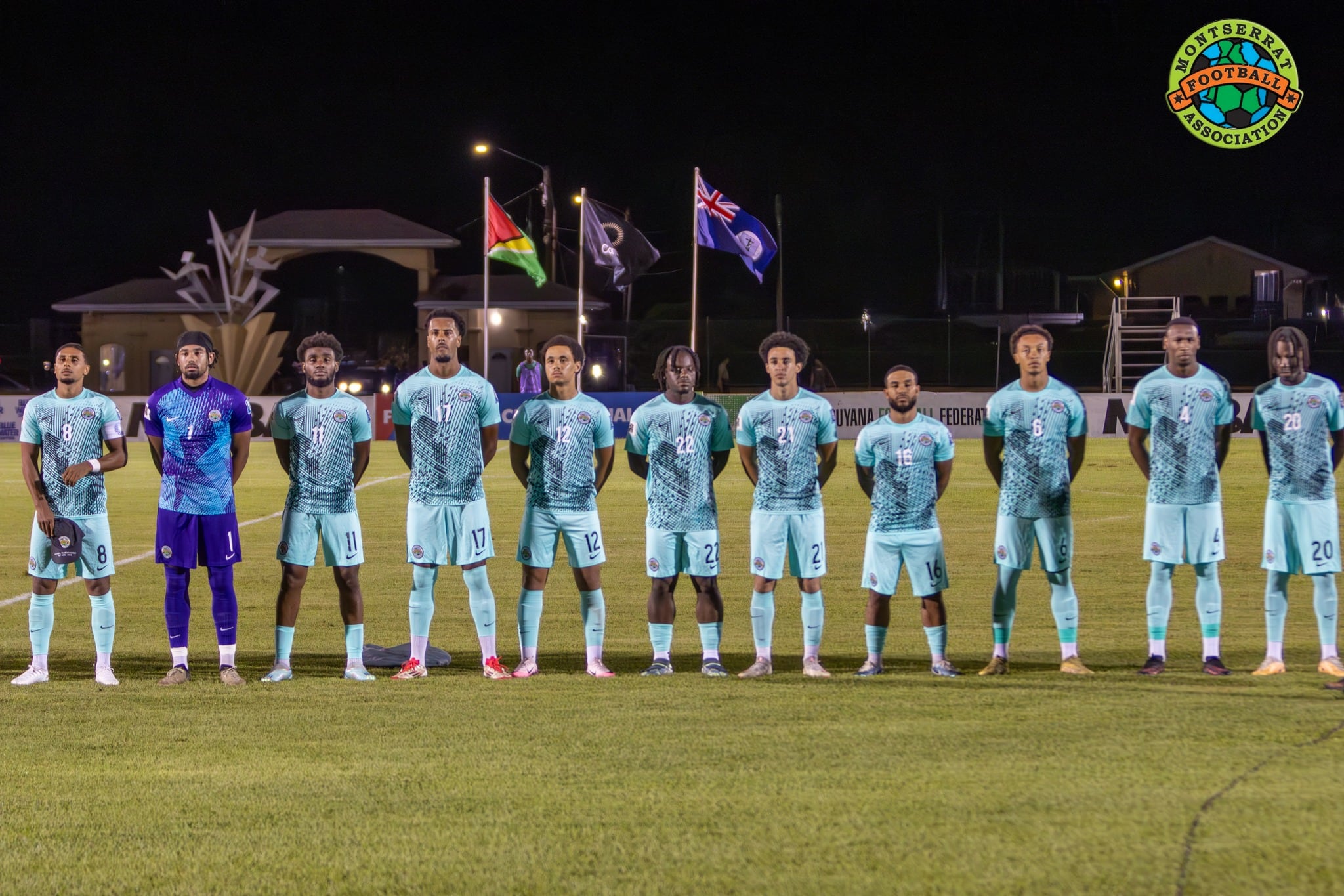 Selección de Montserrat los jugadores en fila previo a enfrentar a Guyana por la Clasificación del Mundial 2026.