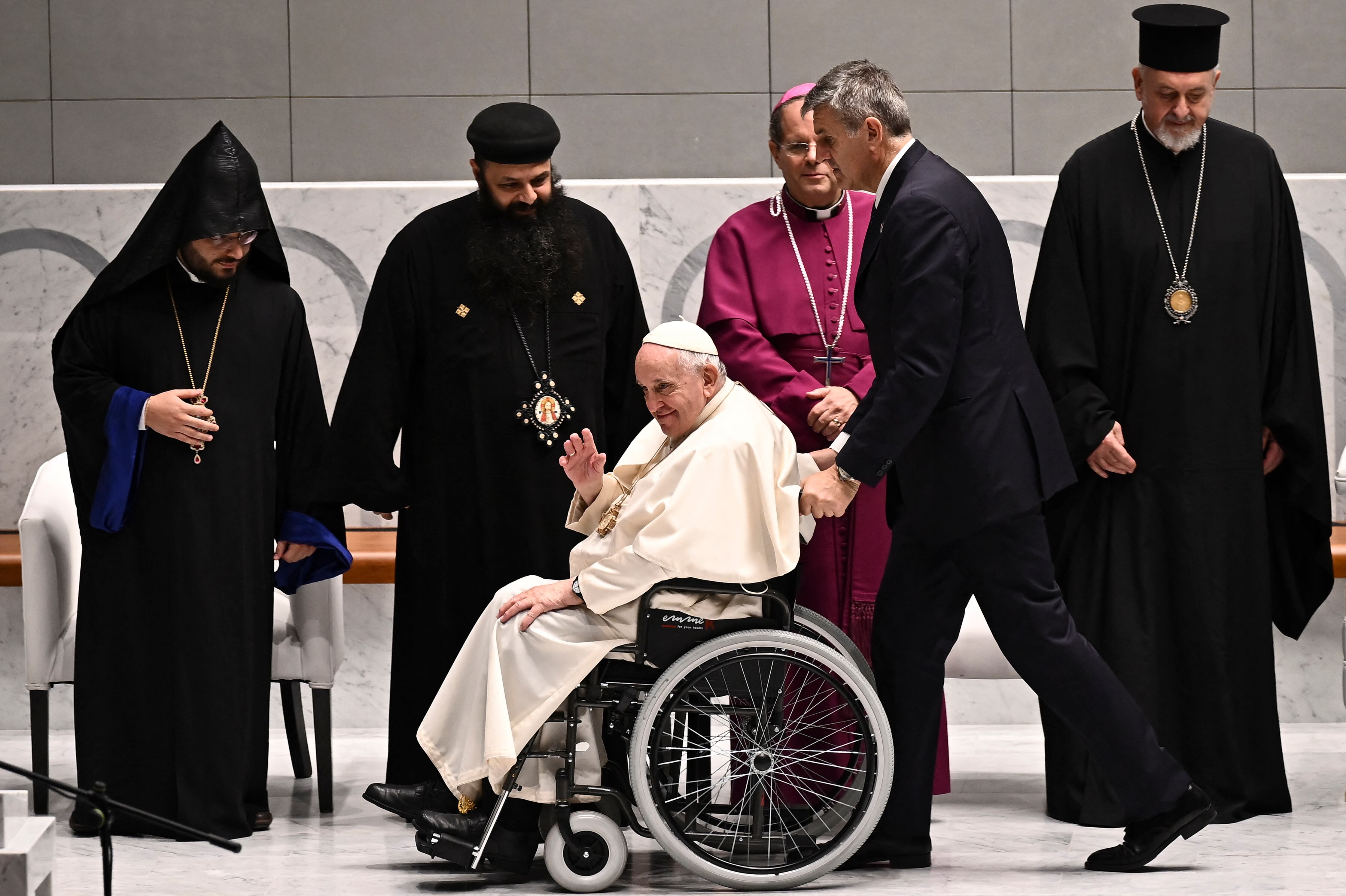 Pope Francis leaves the Cathedral of Our Lady of Arabia in Awali, south of the Bahraini capital Manama, on November 4, 2022. (Photo by Marco BERTORELLO / AFP)