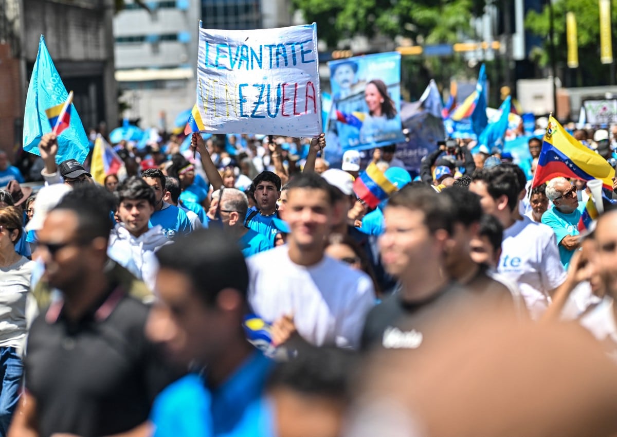 . “¡Elecciones ya!”, gritaron unos 300 simpatizantes de la oposición durante la manifestación en Caracas el 28 de julio, pocos días antes del inicio de conversaciones orientadas a una transición política respaldada por Estados Unidos.