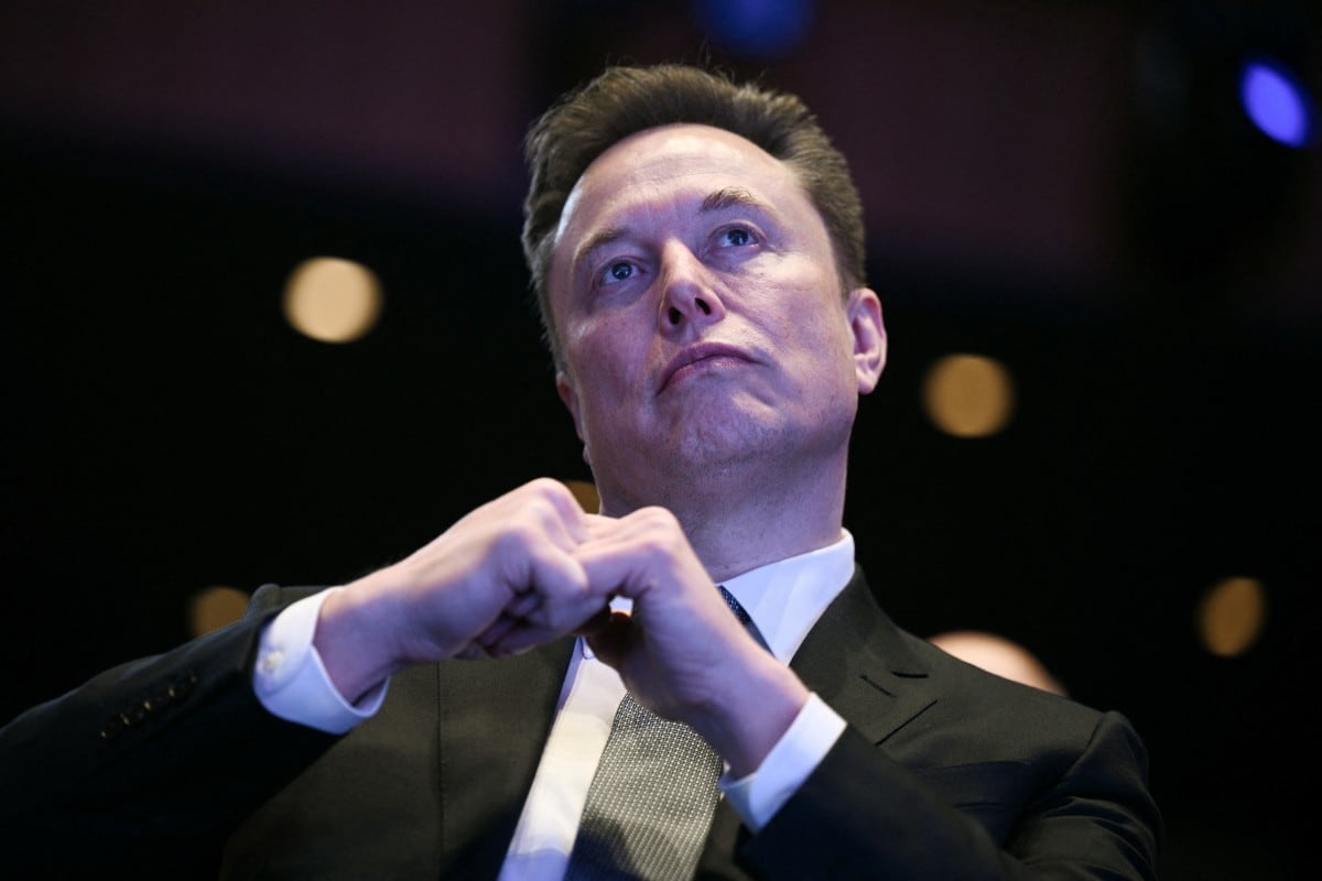 (FILES) Elon Musk looks on as US President Donald Trump speaks at the US-Saudi Investment Forum at the John F. Kennedy Center for the Performing Arts in Washington, DC on November 19, 2025. Elon Musk has been summoned on April 20, 2026 by the French courts as part of an investigation into alleged abuses on the social media platform X. (Photo by Brendan SMIALOWSKI / AFP)