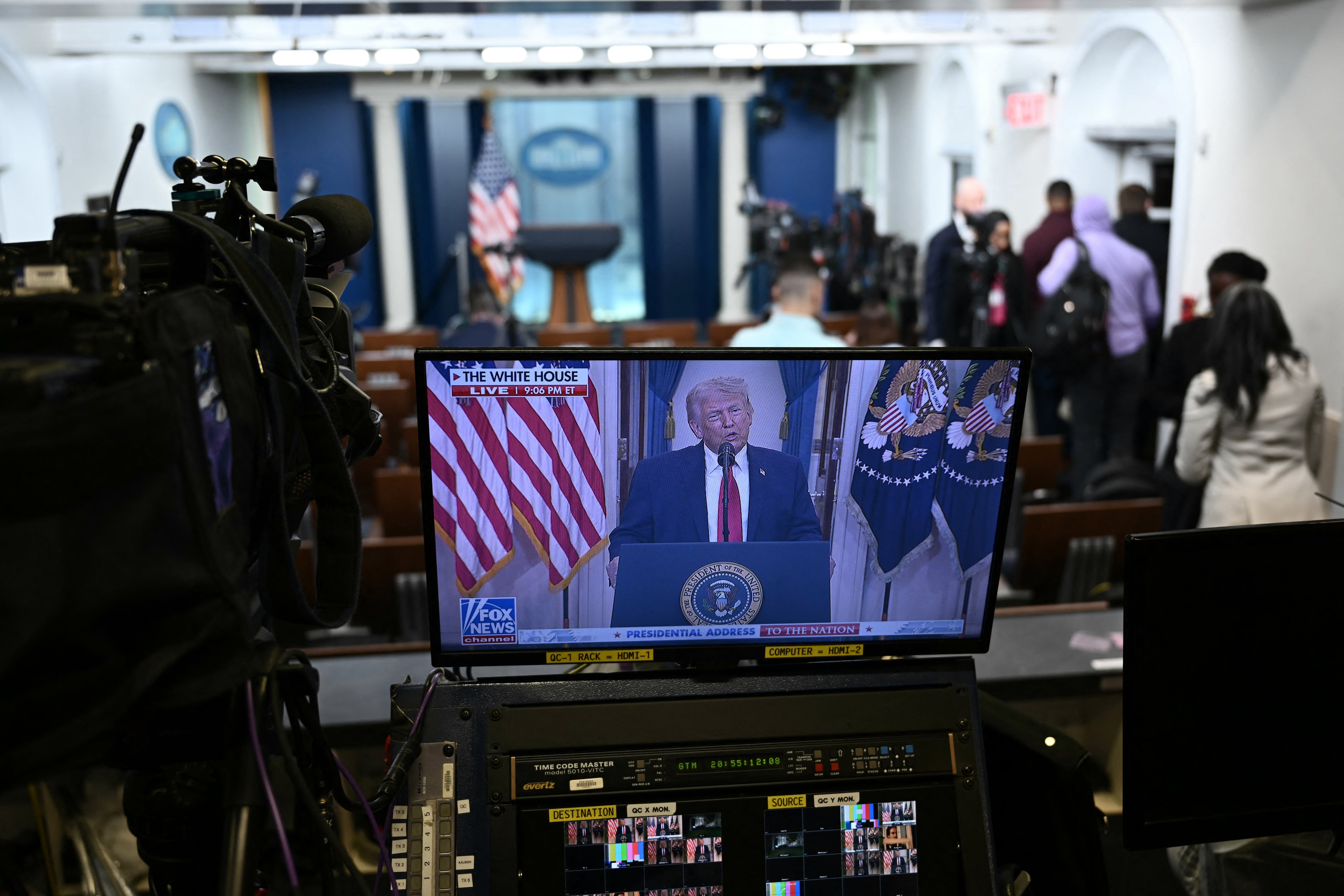 The televised address of US President Donald Trump is seen at the James Brady Press Briefing Room of the White House in Washington, DC on April 1, 2026. (Photo by Brendan SMIALOWSKI / AFP)