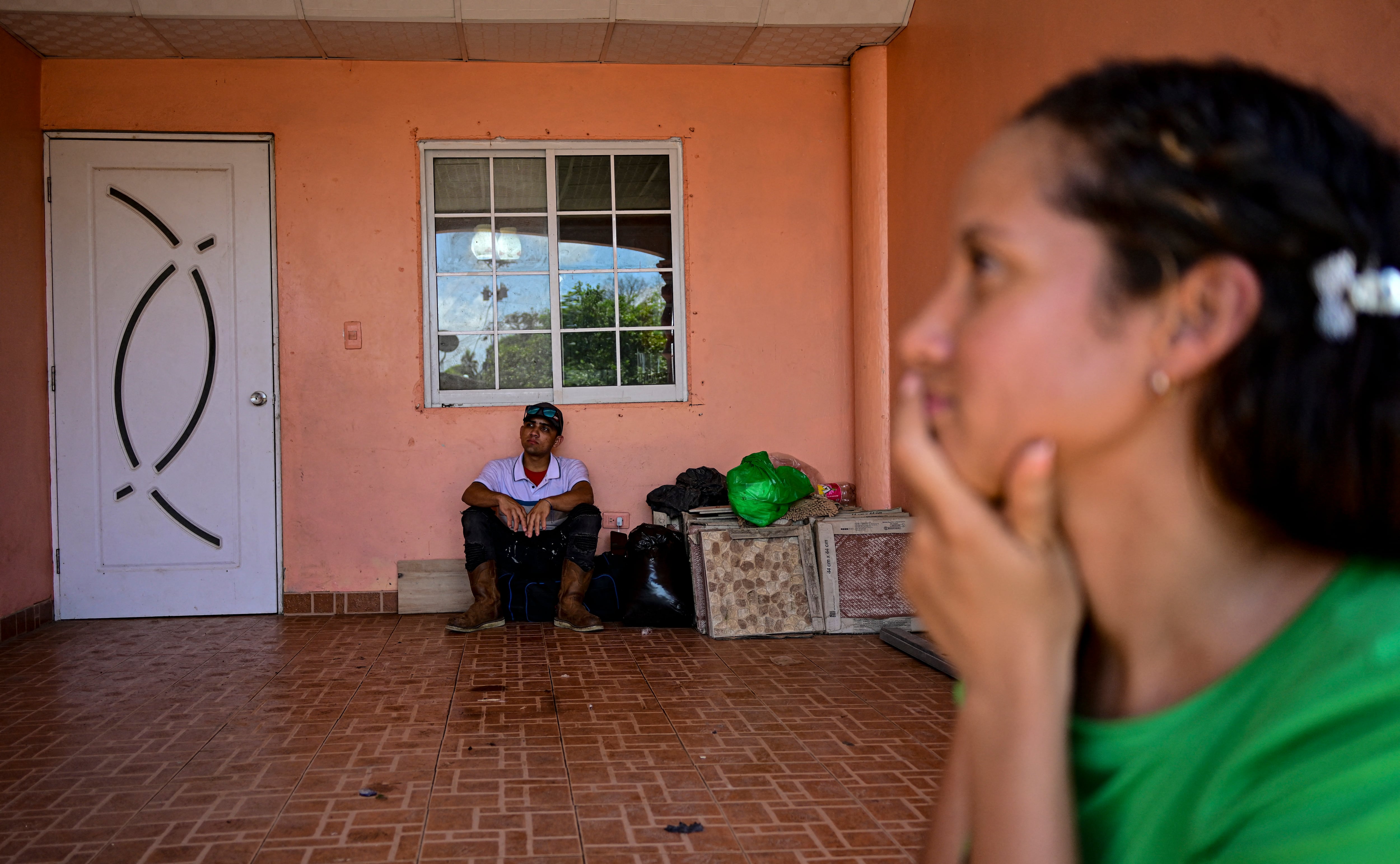 Migrants bound for Colombia wait for a boat in Miramar, near Palenque, Panama, on March 5, 2025. Although Central American governments say they are trying to organize reverse migration, chaos reigns. The governments of Panama and Costa Rica keep migrants in shelters in remote border areas, but many of them undertake their return alon