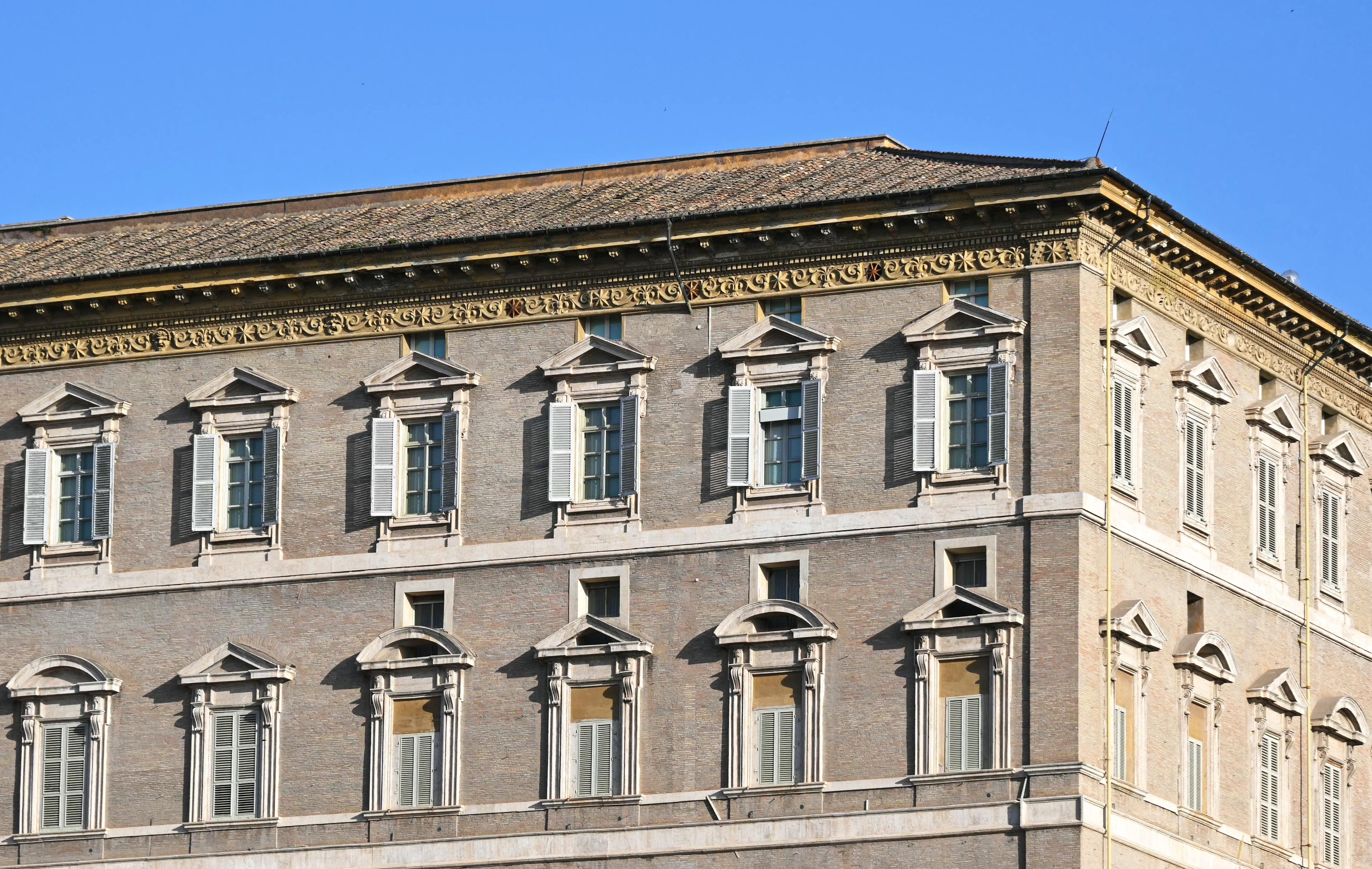This photograph shows a view of the Papal appartments of the Apostolic palace at the Vatican, a day after the Pope's death, on April 22, 2025. The Pope died of a stroke, the Vatican announced hours after the death on April 21, 2025, of the 88-year-old reformer who inspired devotion but riled traditionalists during 12 years leading the Catholic Church. (Photo by Andreas SOLARO / AFP)