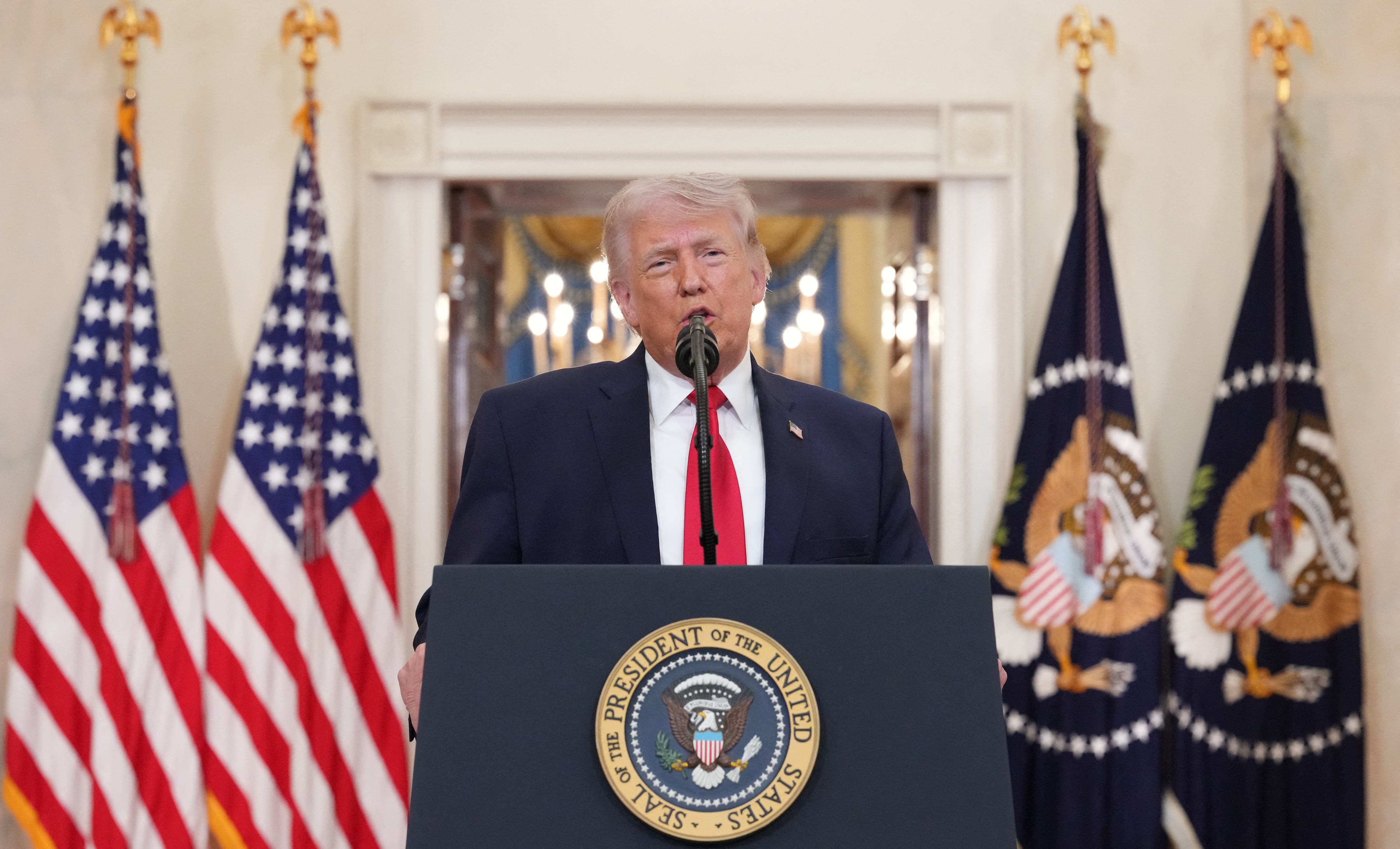 US President Donald Trump speaks during a televised address on the conflict in the Middle East from the Cross Hall of the White House in Washington, DC on April 1, 2026. (Photo by Alex Brandon / POOL / AFP)