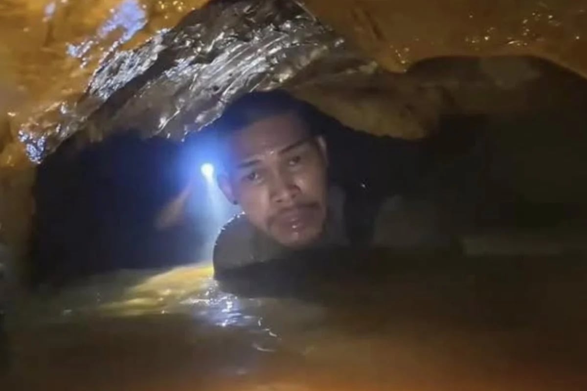 Las lluvias y los estrechos túneles complican el rescate de siete personas atrapadas desde hace cinco días en una cueva del Laos.