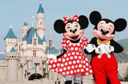 **FOR IMMEDIATE RELEAE** In this photo released by Hong Kong Disneyland, Disney characters Mickey Mouse and Minnie Mouse pose in front of the Sleeping Beauty Castle in Hong Kong's Disneyland Park, Sept. 1, 2005. (AP Photo/Disneyland, Mark Ashman)