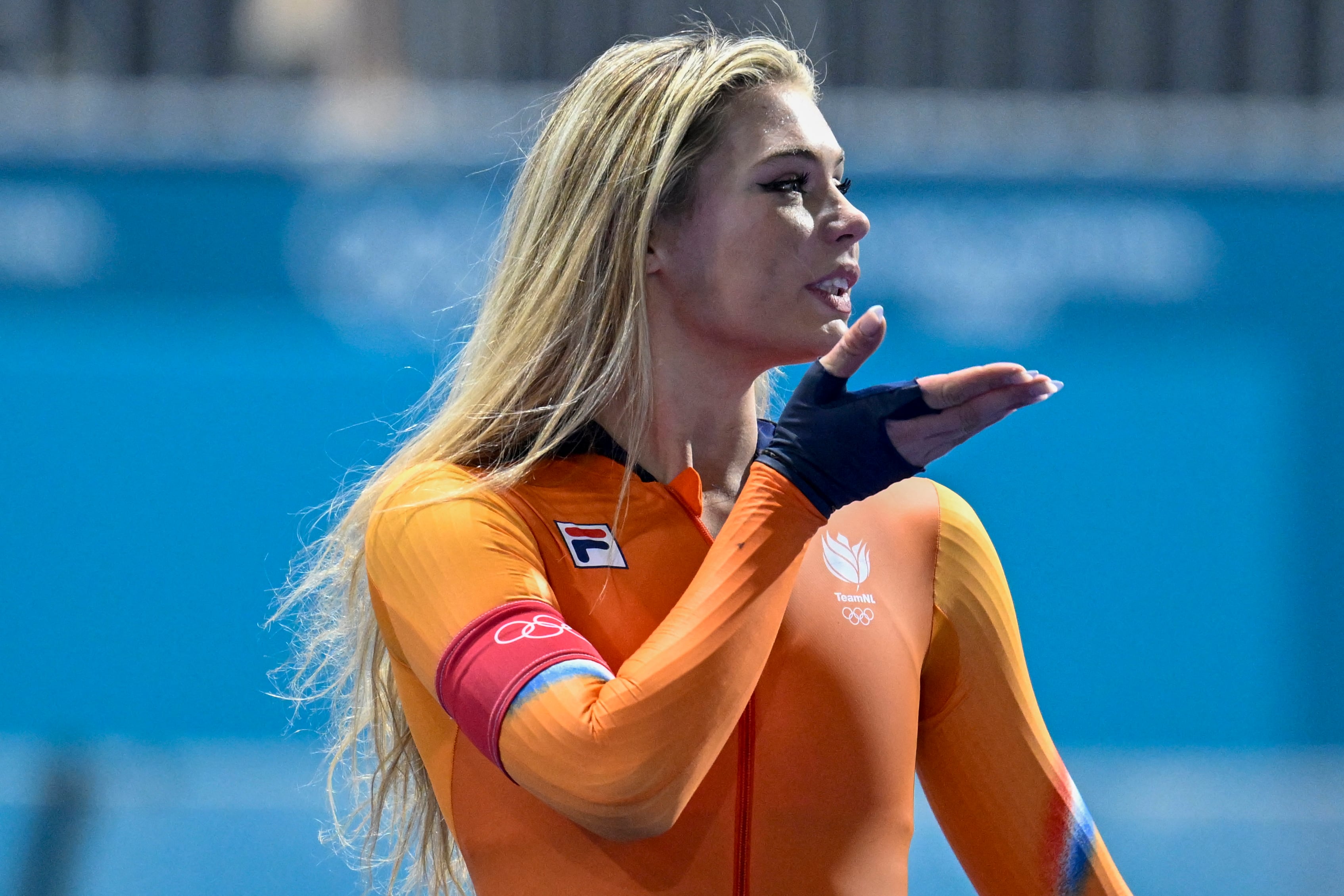 Netherlands' Jutta Leerdam celebrates after winning gold in the speed skating women's 1000m during the Milano Cortina 2026 Winter Olympic Games at Milano Speed Skating Stadium in Milan on February 9, 2026. (Photo by WANG Zhao / AFP)