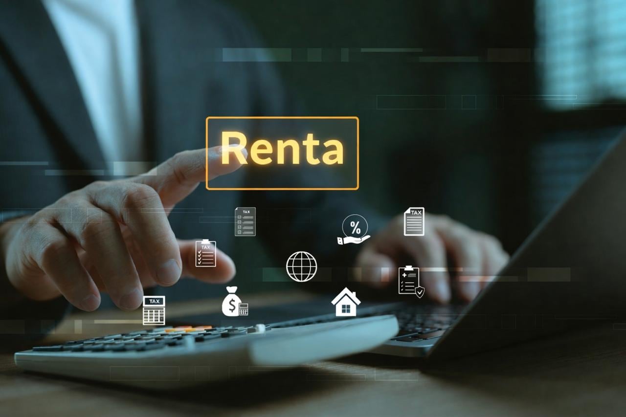Una persona en un teclado y con la palabra Renta