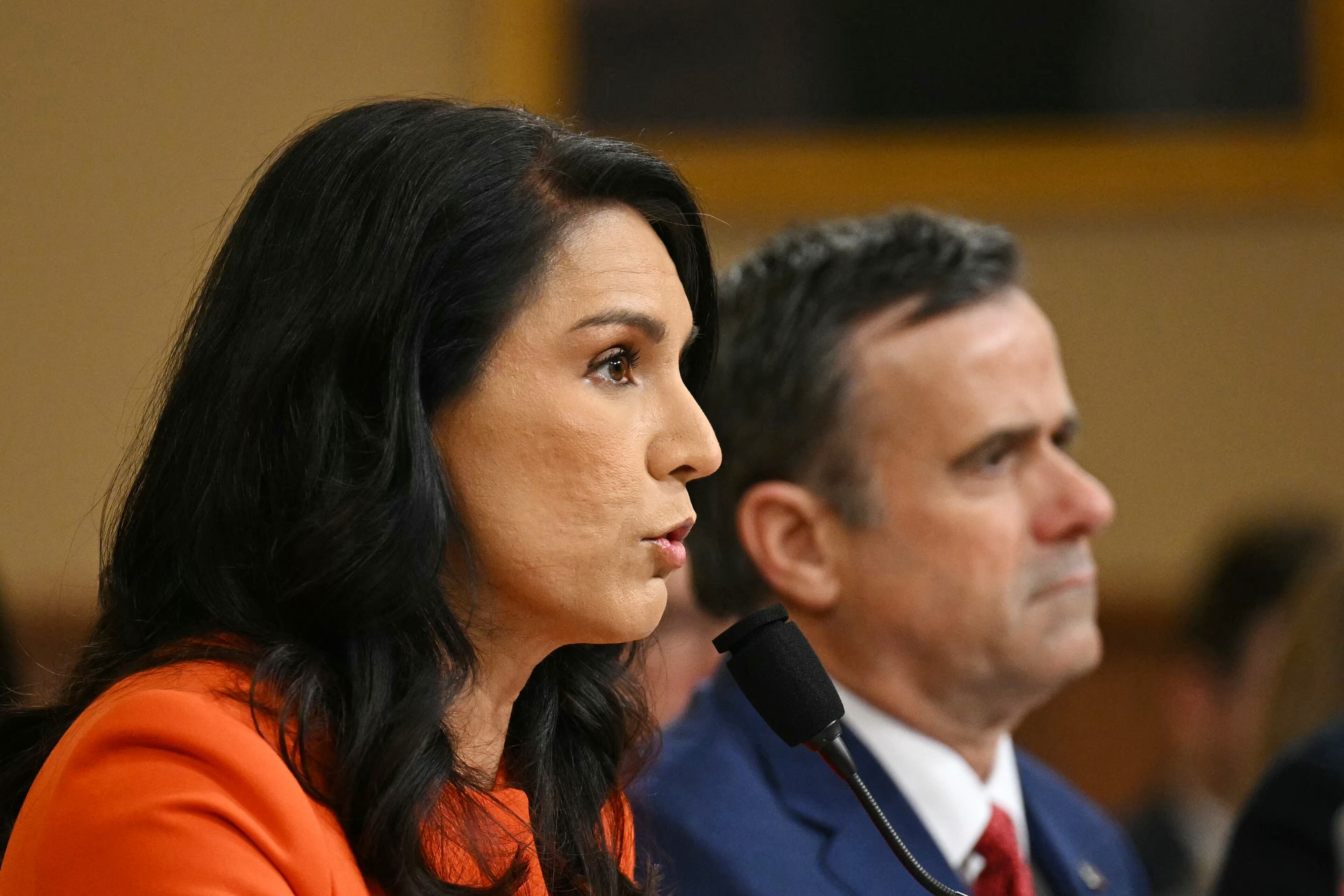 (L-R) The Director of National Intelligence, Tulsi Gabbard, and CIA Director, John Ratcliffe, testify before a House Permanent Select Committee on Intelligence hearing on "Worldwide Threats," on Capitol Hill in Washington, DC, on March 26, 2025. (Photo by Drew ANGERER / AFP)